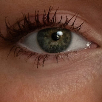 Close-up of a person's eye with detailed skin texture